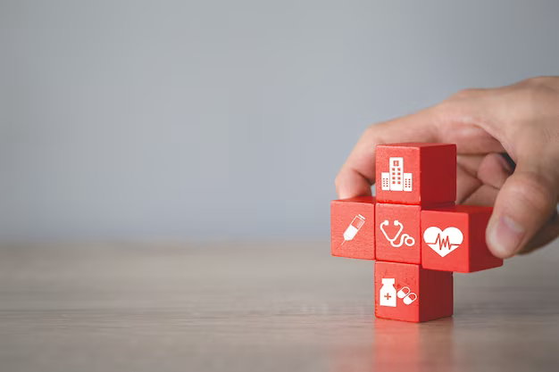 Hand holding red cubes with medicine elements